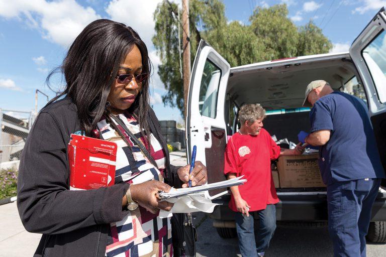 Mercy Egbujor, TVFSON alumni, working with a mobile health unit.